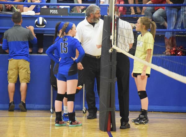 Union City’s captains Kennedy Sepulvado and Morgan Englebretson meet with refs and SWC captain Karleigh Brown. Photo courtesy Union City High School.